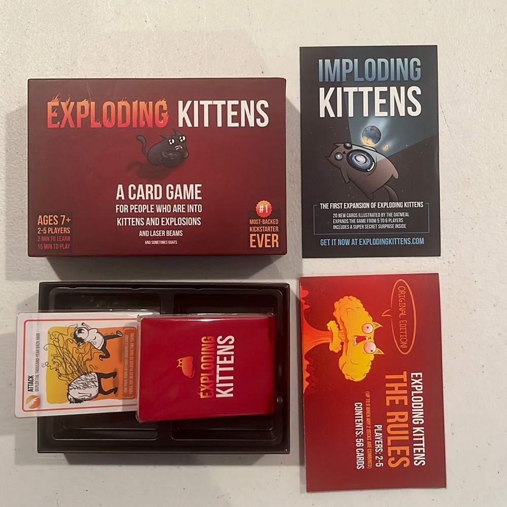 Exploding kittens game. Never used.